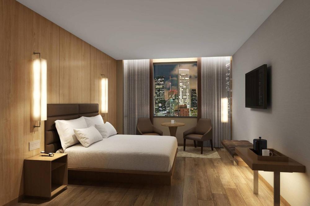 King Guest Room with Sofa Bed and City View interior